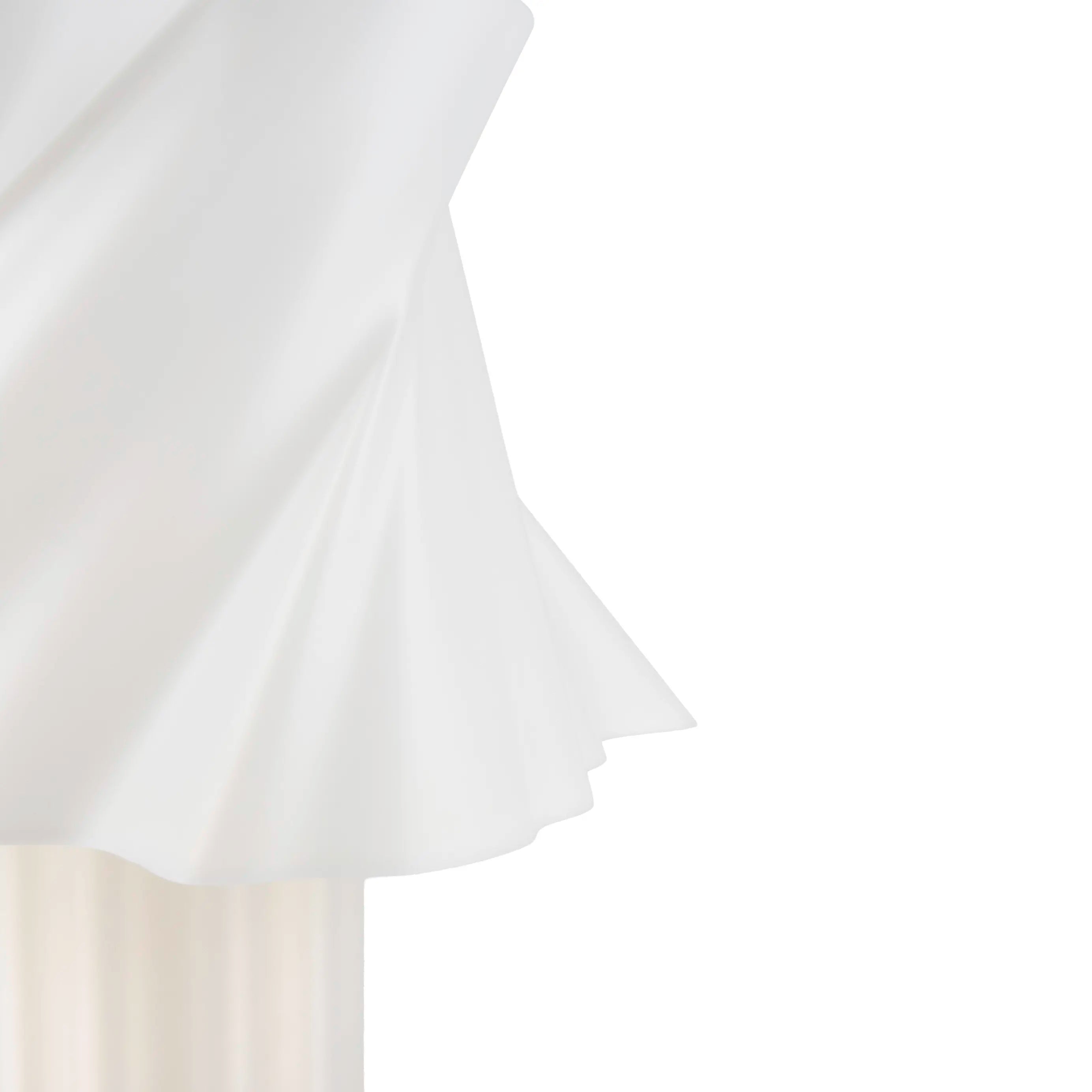Lampe blanche design créant une ambiance lumineuse dans une chambre — LUMY PARIS