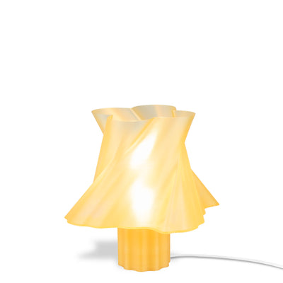 Lampe dorée design créant une ambiance élégante — luminaire à poser made in France — LUMY PARIS